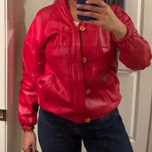 vintage red leather jacket with zipper and buttons